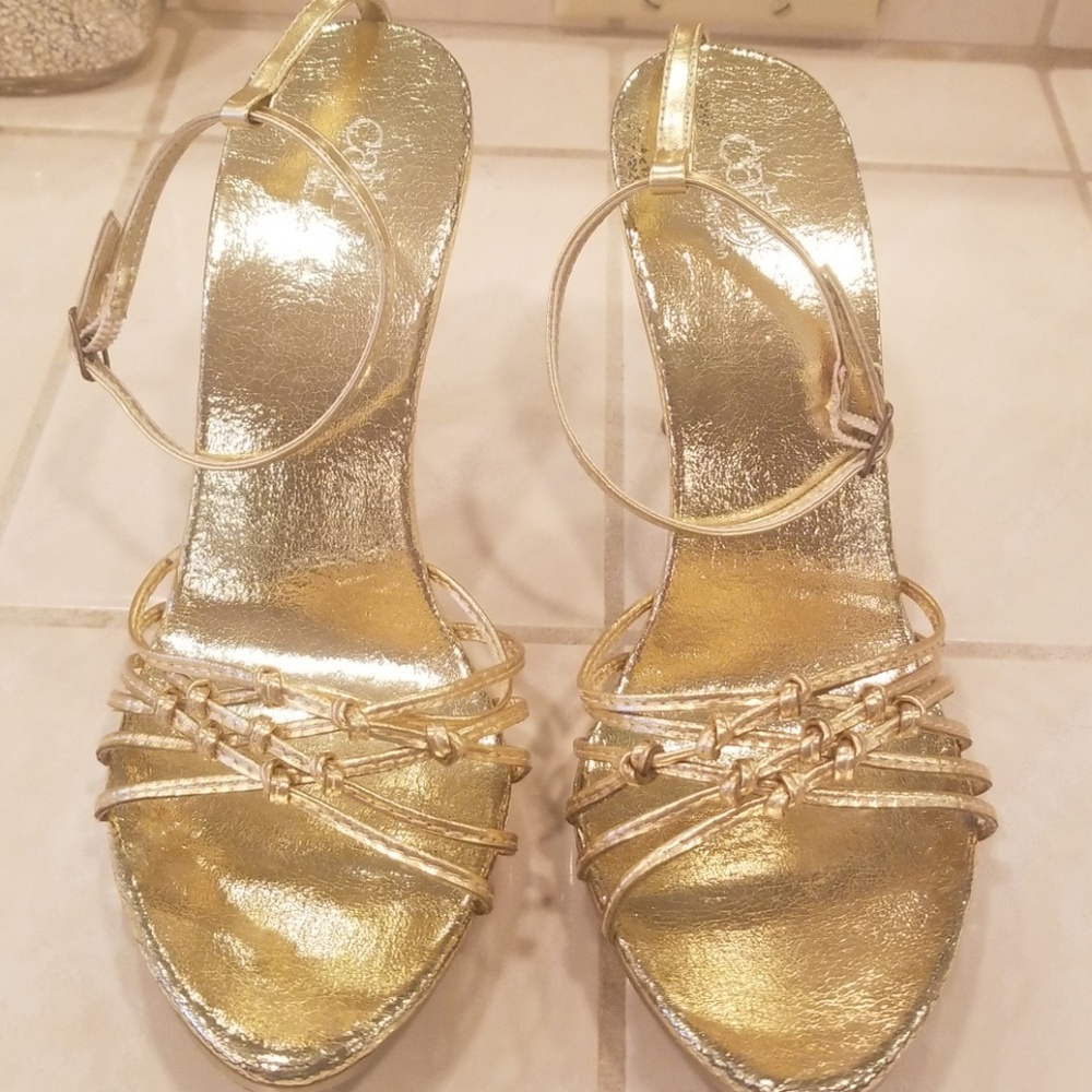 Gold strappy heels in size 7.5